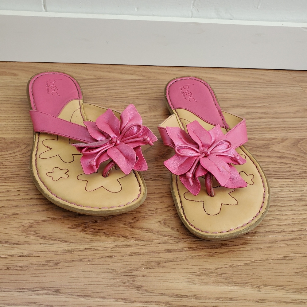 Boc pink flower flip flops measure 9 1/2 inches